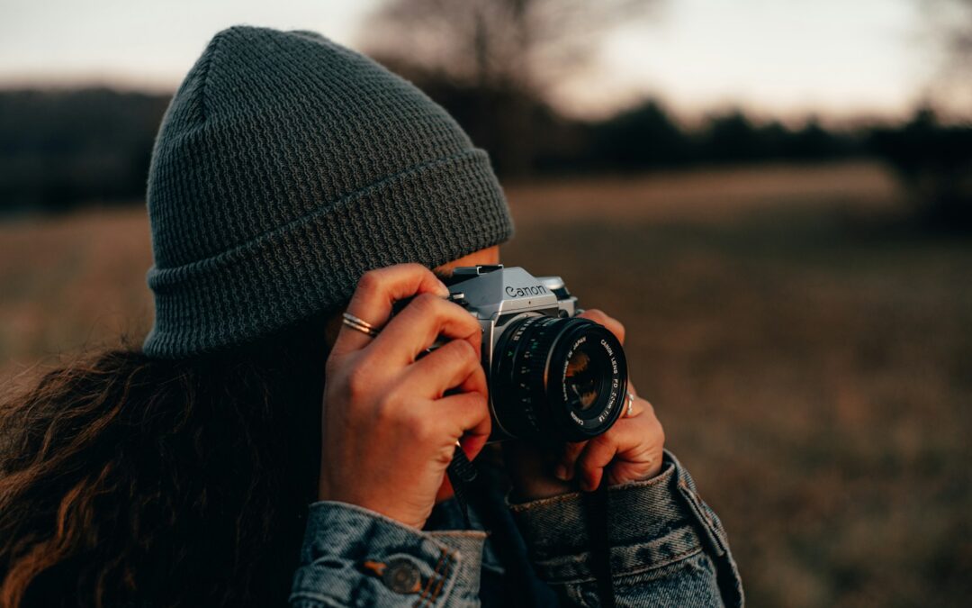 woman with DSLR camera
